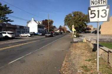 A Bensalem Township street near a Pennsylvania Route 513 marker.